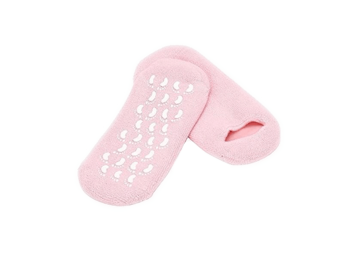 Roze sokjes Yumi Feet baby voetjes thuis 